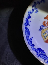 Two Chinese armorial cups and a saucer for the Belgian market, Qianlong