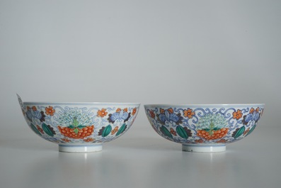 A pair of Chinese doucai bowls with floral famille rose medallions, 4-character mark, 19/20th C.