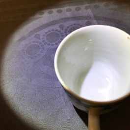 Two Chinese armorial cups and a saucer for the Belgian market, Qianlong