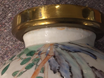 A Chinese famille rose bronze-mounted yuhuchunping vase, Qianlong mark, 19/20th C.