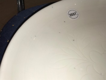 A Chinese Dehua blanc de Chine dish with incised floral design, Kangxi