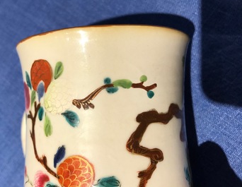 Five Chinese famille rose and blue and white mugs and a covered jug, mostly Qianlong