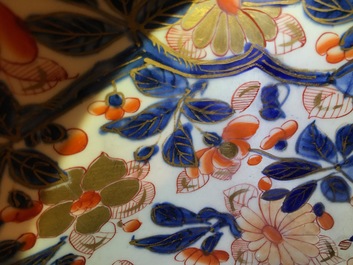 A Chinese clobbered blue and white kraak porcelain bowl with floral design, Wanli