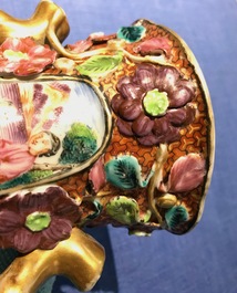 A pair of Chinese famille rose relief-decorated mandarin vases, Qianlong