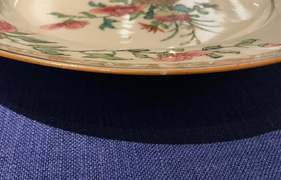 A Chinese famille rose plate with a flower basket, Yongzheng