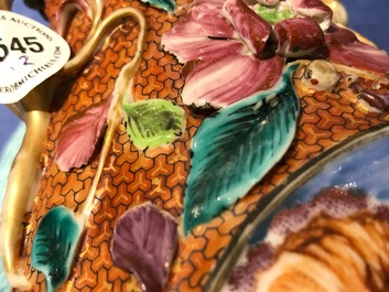 A pair of Chinese famille rose relief-decorated mandarin vases, Qianlong