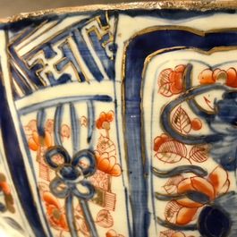 A Chinese clobbered blue and white kraak porcelain bowl with floral design, Wanli
