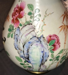 A Chinese famille rose bronze-mounted yuhuchunping vase, Qianlong mark, 19/20th C.