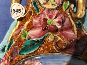 A pair of Chinese famille rose relief-decorated mandarin vases, Qianlong