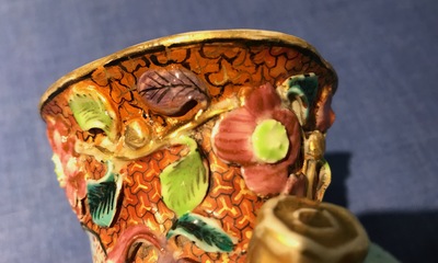 A pair of Chinese famille rose relief-decorated mandarin vases, Qianlong