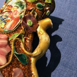A pair of Chinese famille rose relief-decorated mandarin vases, Qianlong