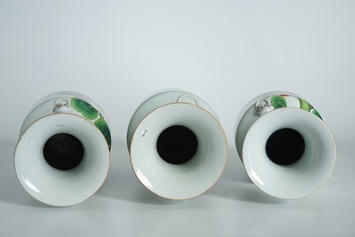 A pair of Chinese famille rose vases with goats and one with roosters, 20th C.