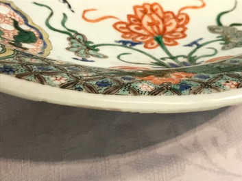 A Chinese famille verte Buddhist lion charger, Kangxi