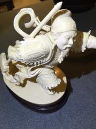 A Chinese ivory warrior and Chang'e on wooden stands, 19/20th C.