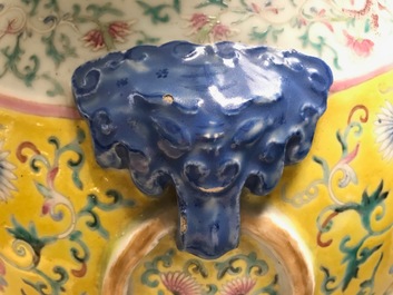 A tall Chinese famille rose yellow-ground vase with a tiger, Qianlong mark, 19th C.