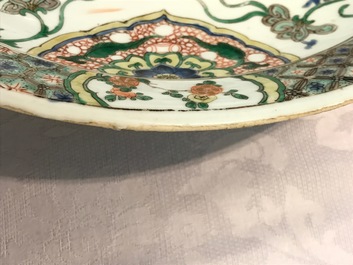 A Chinese famille verte Buddhist lion charger, Kangxi