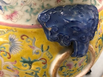 A tall Chinese famille rose yellow-ground vase with a tiger, Qianlong mark, 19th C.