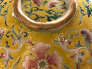 A tall Chinese famille rose yellow-ground vase with a tiger, Qianlong mark, 19th C.