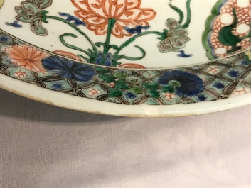 A Chinese famille verte Buddhist lion charger, Kangxi