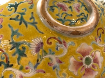 A tall Chinese famille rose yellow-ground vase with a tiger, Qianlong mark, 19th C.