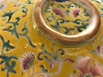 A tall Chinese famille rose yellow-ground vase with a tiger, Qianlong mark, 19th C.