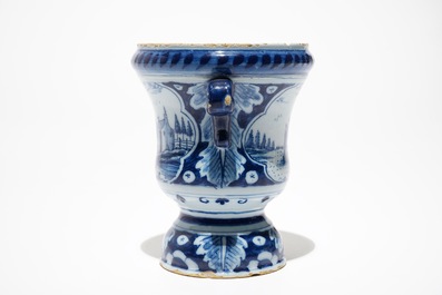 A Dutch Delft blue and white flower urn, 18th C.