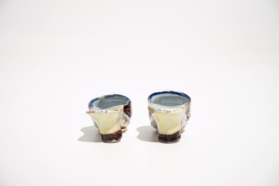 A pair of small polychrome Dutch Delft slippers, 18th C.