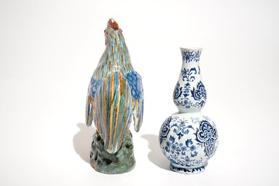 A polychrome Delft style rooster and a blue and white vase, D&egrave;svres, France, 19th C.