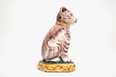 A polychrome Dutch Delft model of a cat, 19th C.