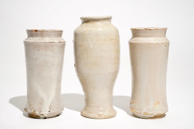 Three monochrome white maiolica albarelli, Italy, 17/18th C.