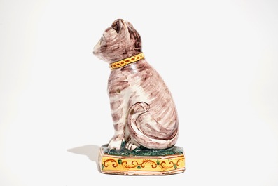 A polychrome Dutch Delft model of a cat, 19th C.