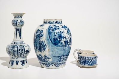 Two Dutch Delft blue and white chinoiserie vases and a cruet stand, 17/18th C.