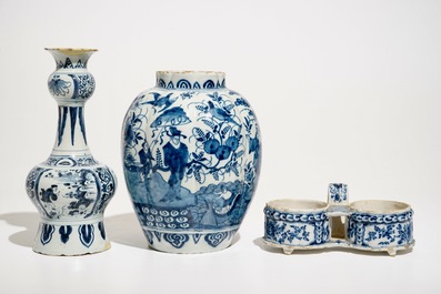 Two Dutch Delft blue and white chinoiserie vases and a cruet stand, 17/18th C.