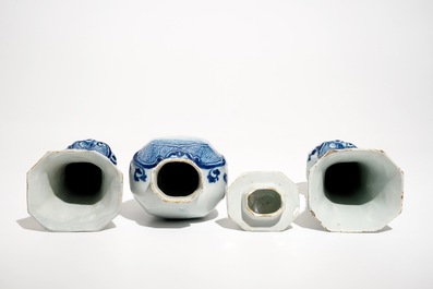 A Dutch Delft blue and white three-piece garniture with a naval scene, 18th C.