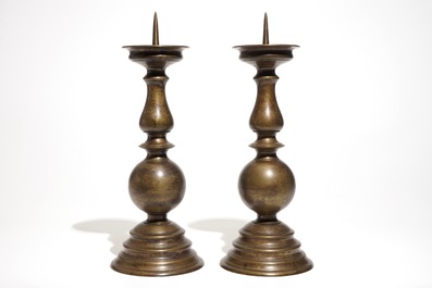 A pair of large Flemish bronze pricket candlesticks, 17th C.