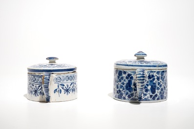 A pair of Dutch Delft blue and white dishes with cherubs and two sugar pots, 18th C.
