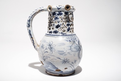A French faience blue and white puzzle jug, poss. Lille, 18th C.