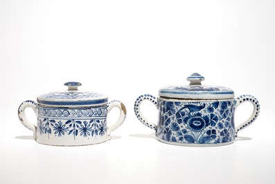 A pair of Dutch Delft blue and white dishes with cherubs and two sugar pots, 18th C.