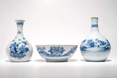 Two English Delftware bottle vases and a bowl, 18th C.