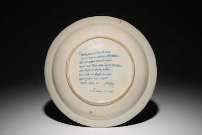 A Dutch Delft blue and white biblical "Amnon and Tamar" dish, dated 1716