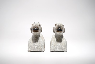 A pair of Chinese cloisonn&eacute; and gilt bronze models of rams, Qianlong