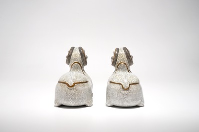 A pair of Chinese cloisonn&eacute; and gilt bronze models of rams, Qianlong