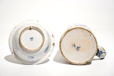 A Dutch Delft blue and white chinoiserie bowl and a polychrome Braunschweig mug, 1st half 18th C.