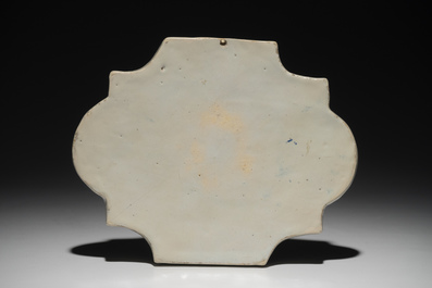 A Dutch Delft blue and white chinoiserie plaque with an elephant, 18th C.