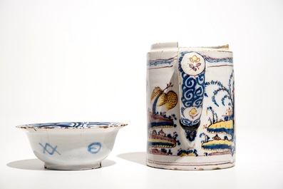 A Dutch Delft blue and white chinoiserie bowl and a polychrome Braunschweig mug, 1st half 18th C.