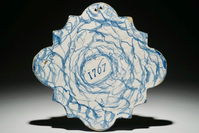 A Dutch Delftware blue and white biblical plaque with "The Baptism of Christ", Amsterdam, dated 1767
