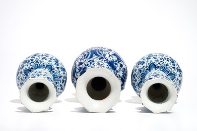 Three Dutch Delft blue and white garlic neck vases with birds on millefiori design, 18th C.