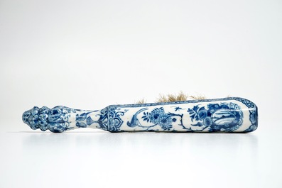 A Dutch Delft blue and white brush with handle, 1st half 18th C.
