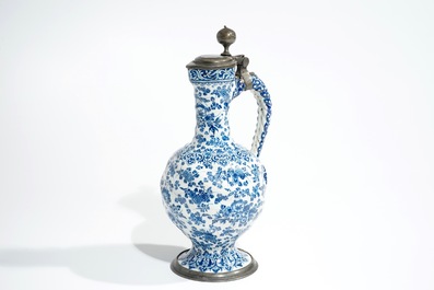 An attractive Dutch Delft blue and white gadrooned pewter-mounted jug, 2nd half 17th C.