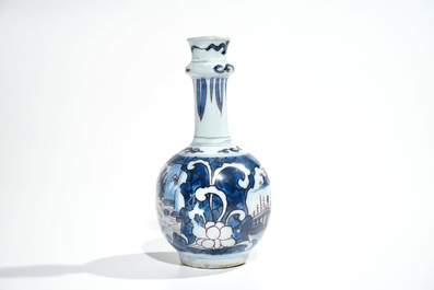 A small Dutch Delft chinoiserie bottle vase in blue, white and manganese, 2nd half 17th C.